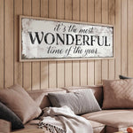 a living room filled with furniture and a wooden wall