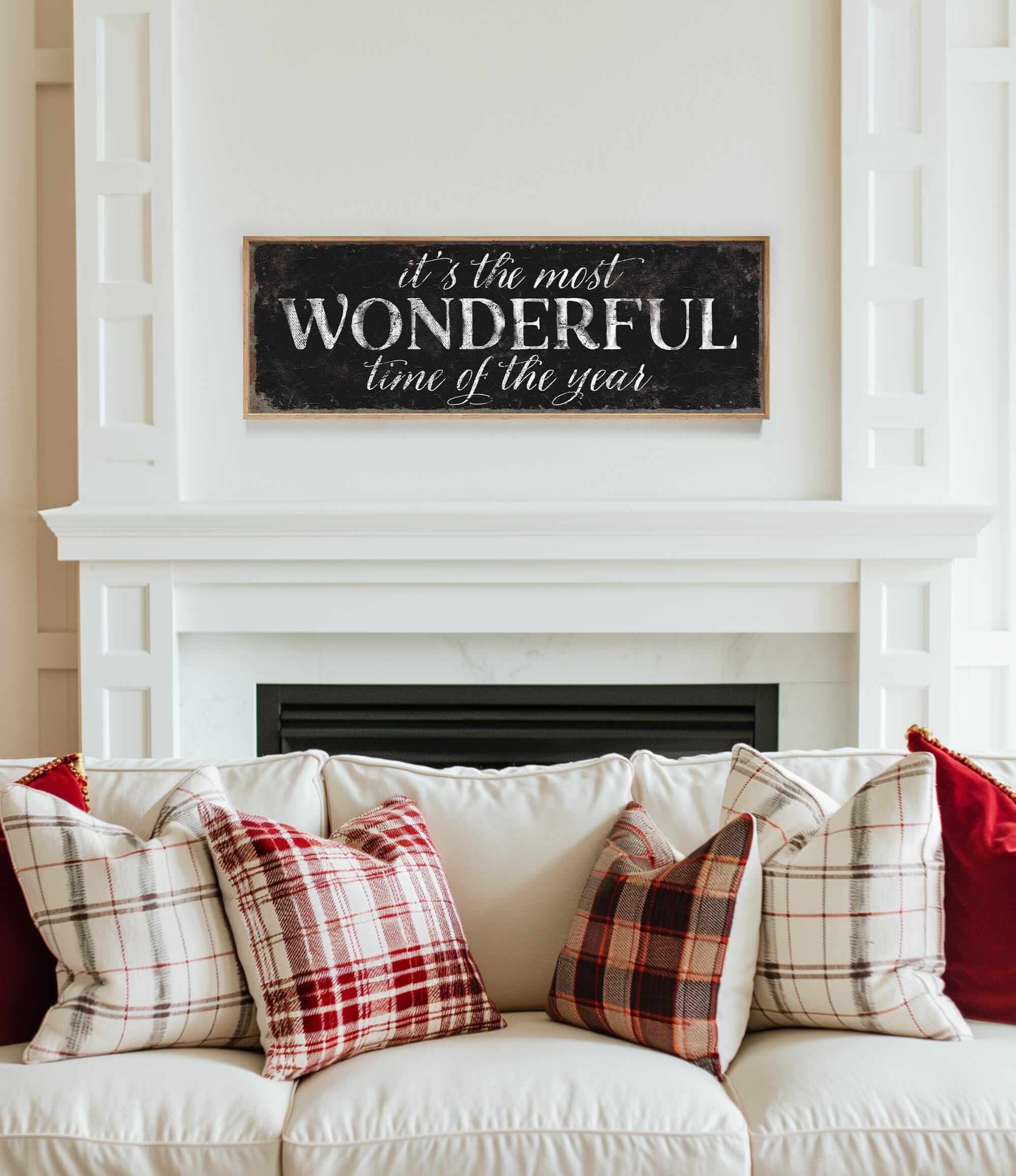 a living room with a white couch and a fireplace