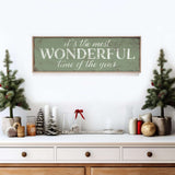 a wooden sign that says it's the most wonderful time of the year