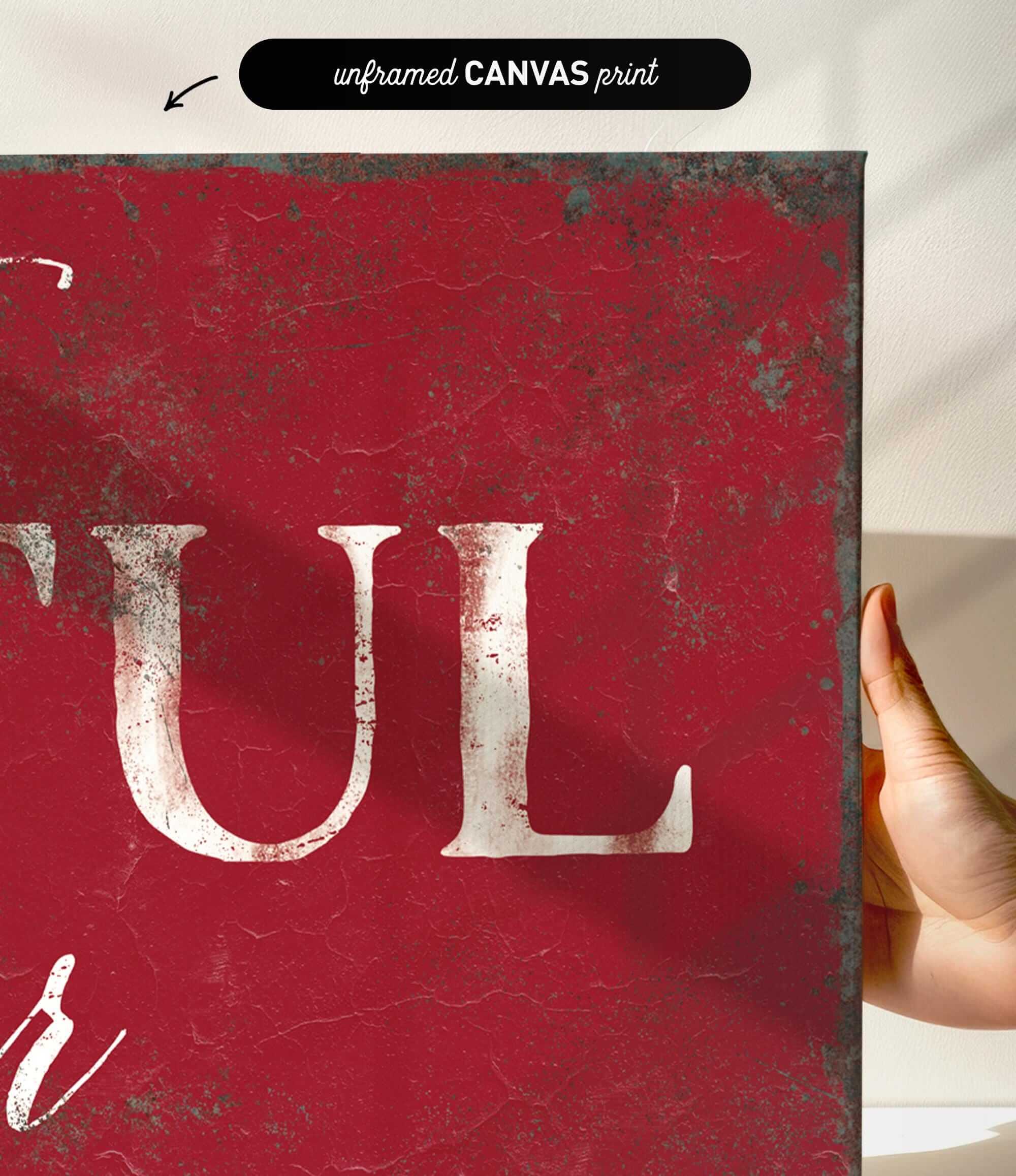 a person holding up a sign with the word tul on it