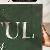 a person holding up a sign that says tull