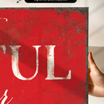 a person holding up a sign that says tull