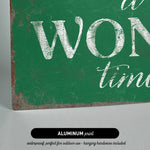 a green sign that says it's a wonderful time