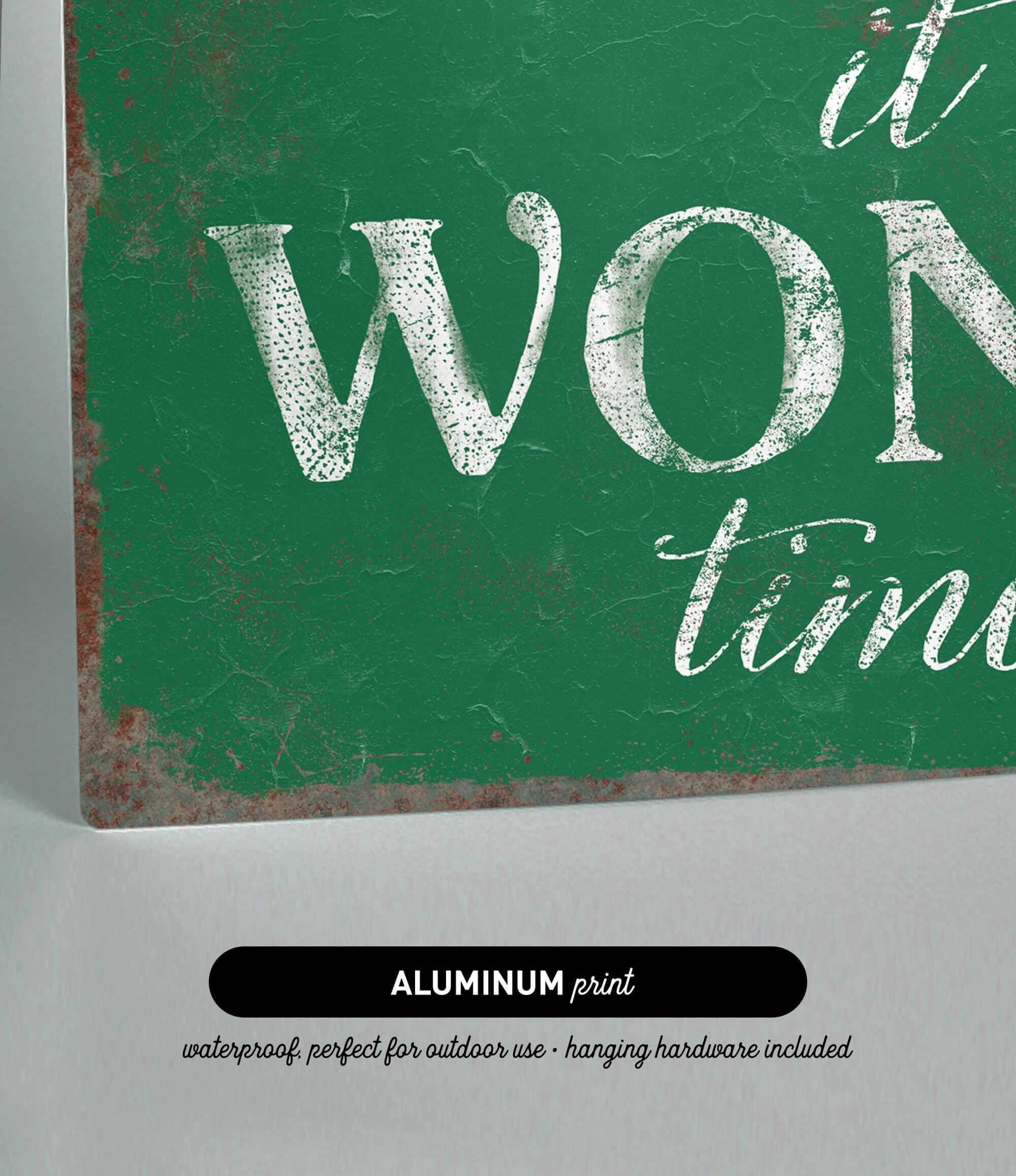 a green sign that says it's a wonderful time