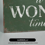 a green sign that says it's a wonderful time