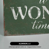 a green sign that says it's a wonderful time