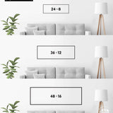 a living room with a couch and a lamp