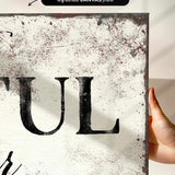 a person holding up a sign that says pull