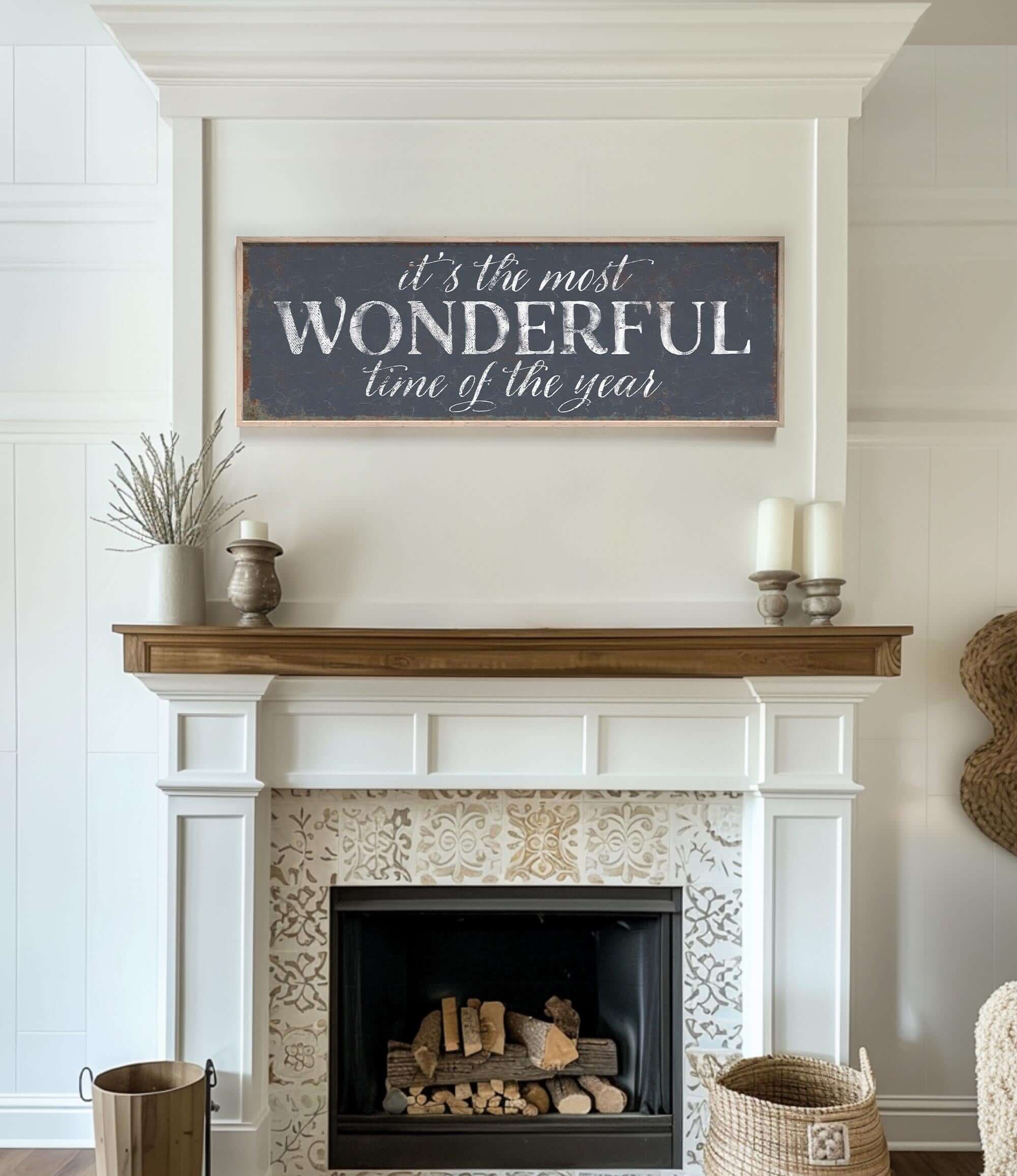 a fireplace with a sign above it that says it's the most wonderful time