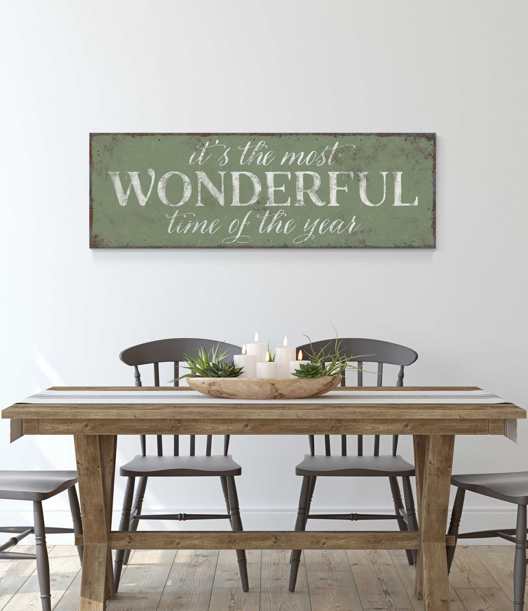 a table with chairs and a sign that says it's the most wonderful time