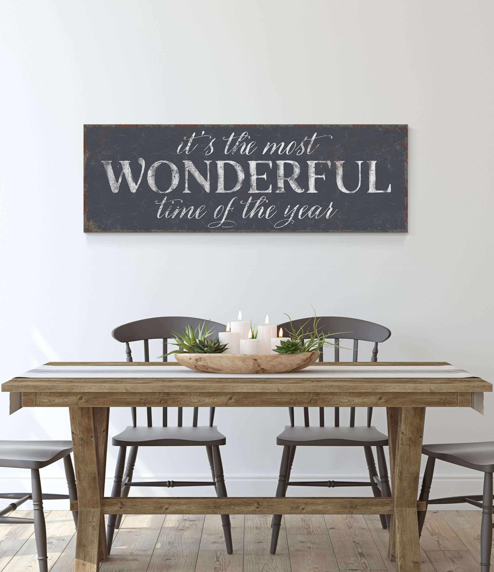 a table with chairs and a sign that says it's the most wonderful time