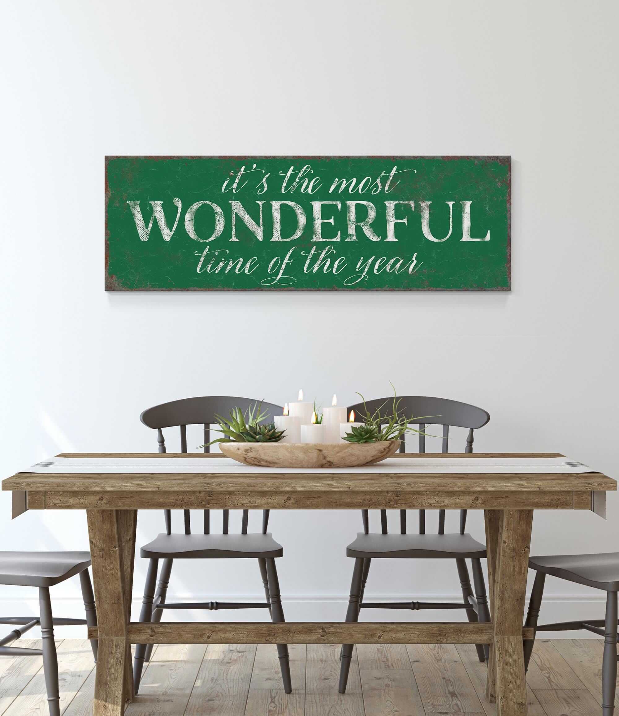 a table with chairs and a sign that says it's the most wonderful time