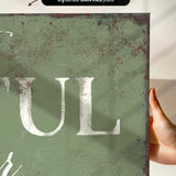 a person holding up a sign that says tull