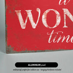 a red sign that says it's won time