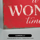 a red sign that says it's won time