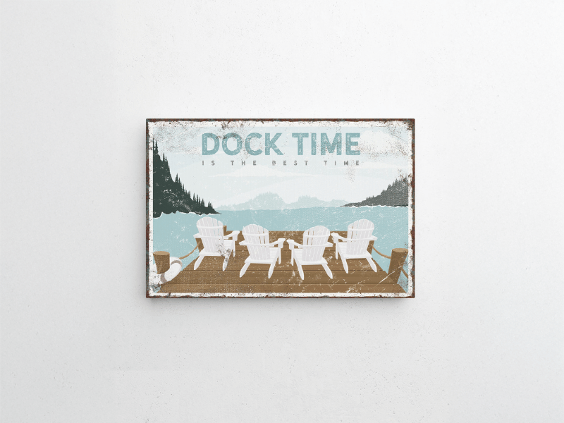 Sign with four Adirondack chairs on a dock, lake and trees, text reads “Dock Time is the Best Time.”.