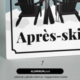 The image is a sign with the word "Apres-ski" written on it, featuring a pair of black chairs and ski equipment.