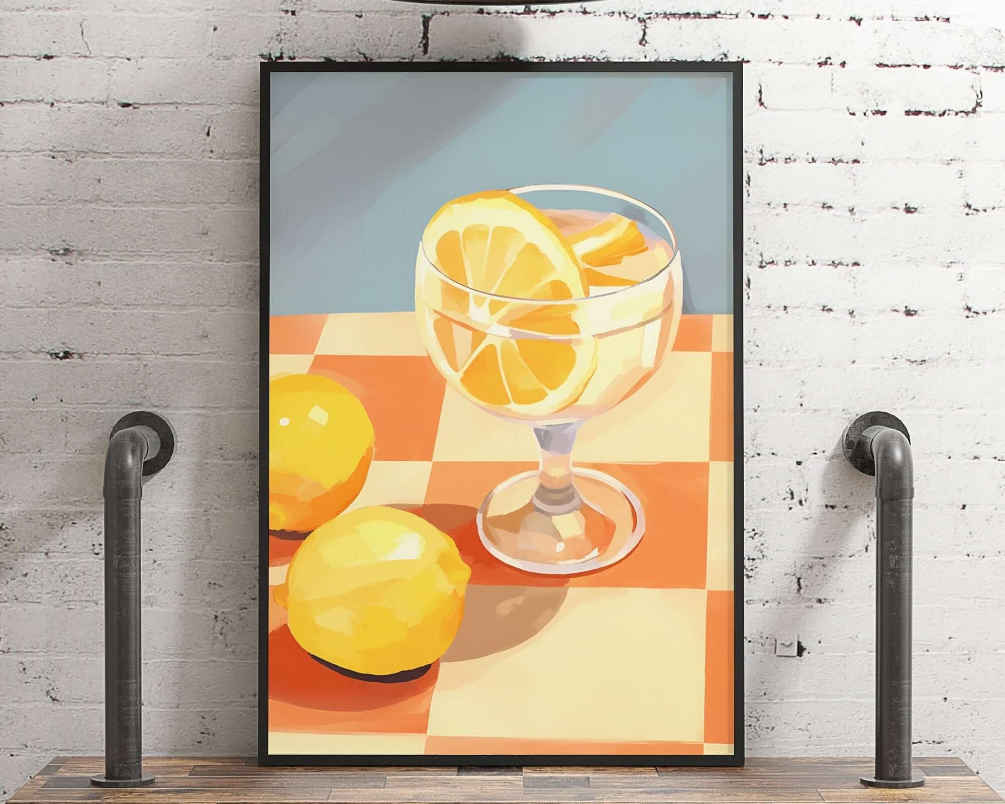 A framed painting depicting a glass of lemonade with lemon slices on a checkered tablecloth, set against a brick wall.