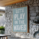 a sign that says let&#39;s play in the waves