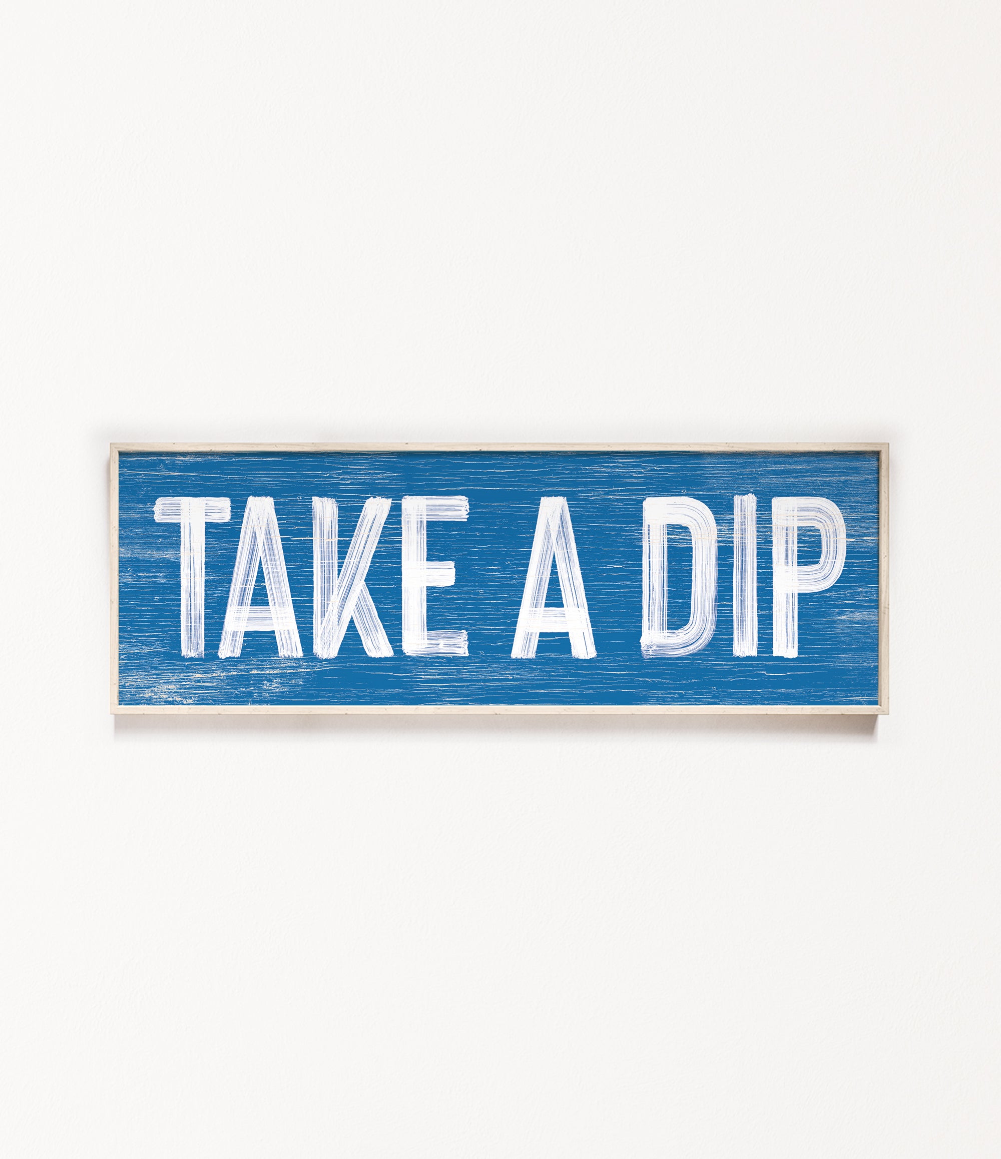 a blue sign that says take a dip