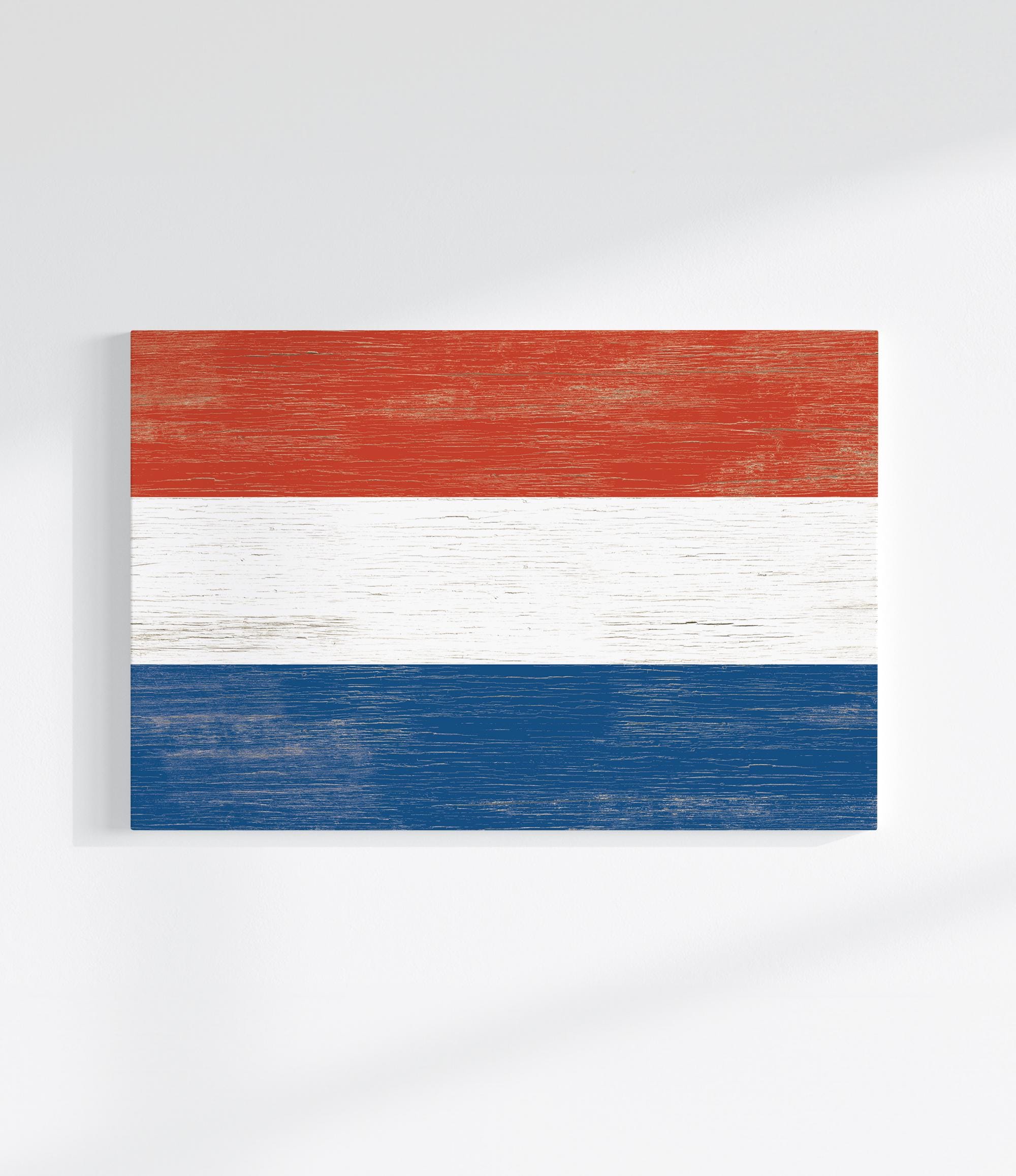 a piece of wood painted in the colors of the dutch flag
