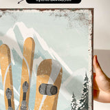 a person holding up a poster with skis on it
