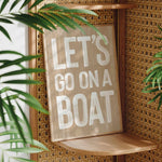a wooden sign that says let&#39;s go on a boat