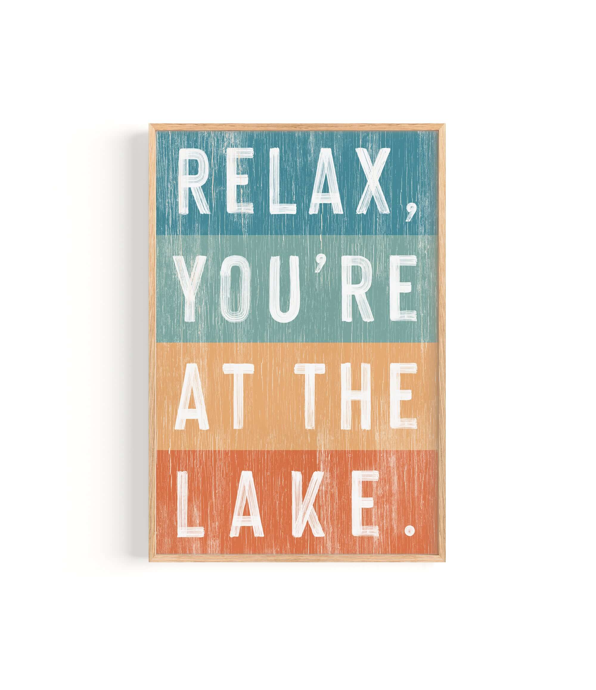 a wooden sign that says relax you're at the lake