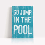 a blue sign that says go jump in the pool