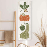 a painting of vegetables on a white wall