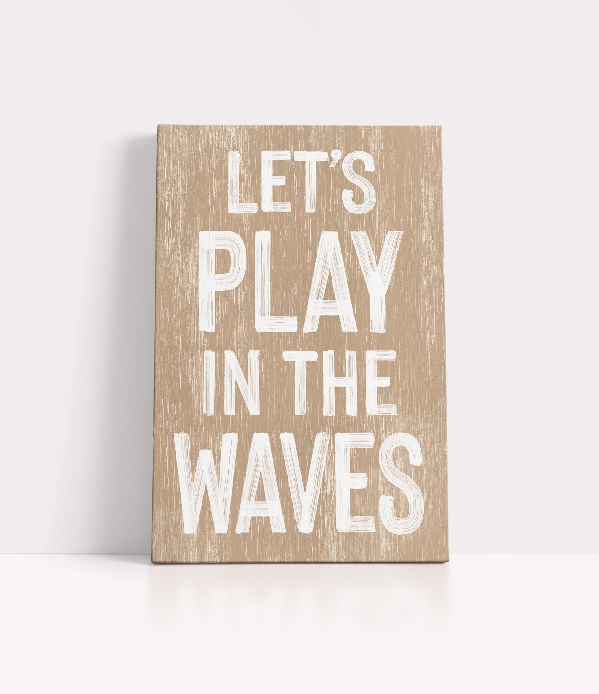 a wooden sign that says let&#39;s play in the waves
