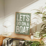 a wooden sign that says let&#39;s go on a boat