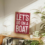 a wooden sign that says let&#39;s go on a boat