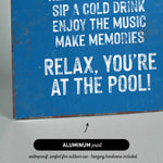 a blue sign that says relax you&#39;re at the pool