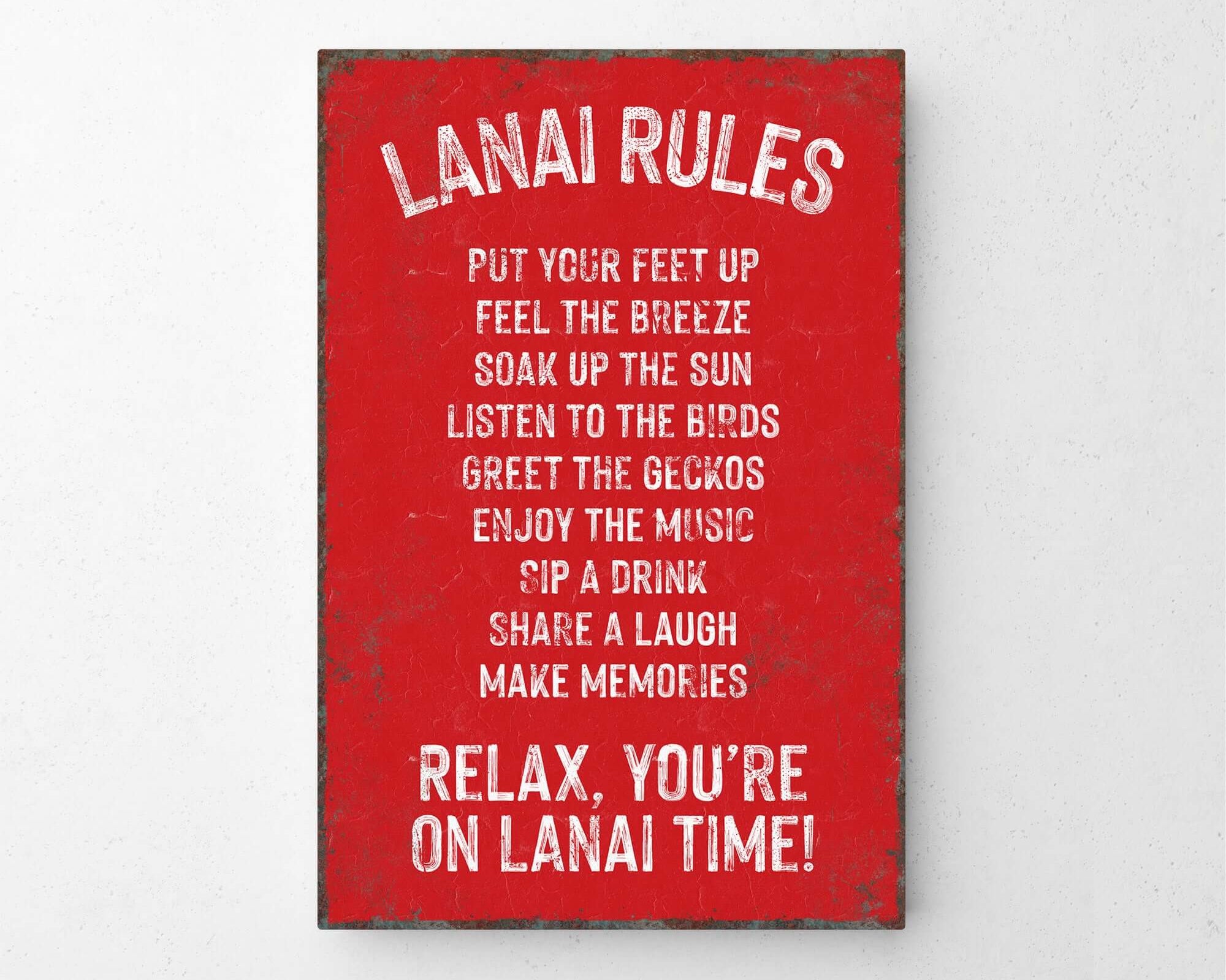 a red sign that reads lanai rules put your feet up feel the breeze break