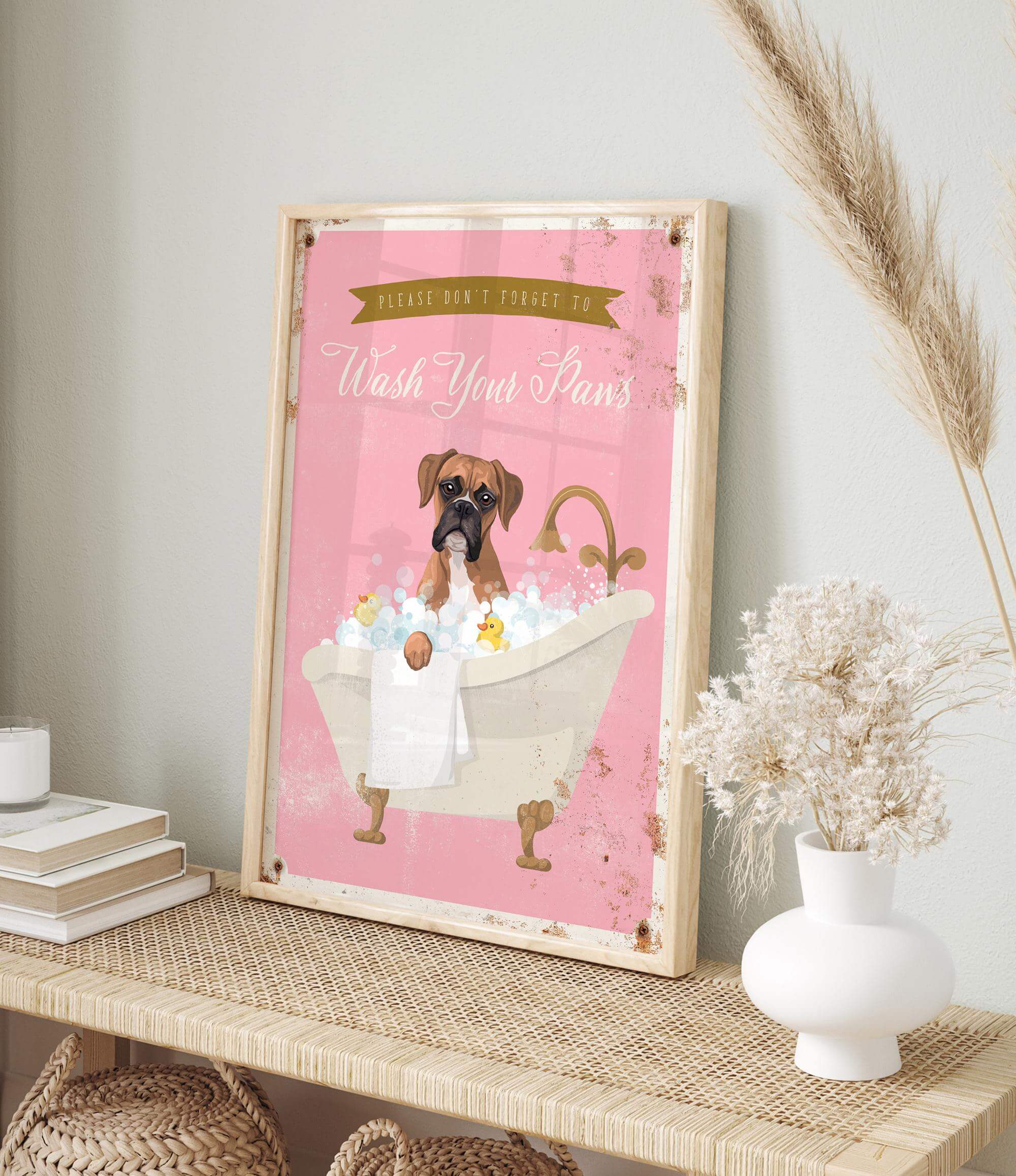 A framed poster with a cartoon image of a dog sitting in a bathtub, accompanied by the text "Please don't forget to wash your paws".