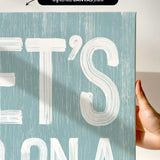 a person holding up a sign that says it&#39;s bona