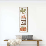 a wooden bench sitting in front of a white wall