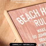 The Beach House Rules Sign is crafted from painted wood in a vibrant coral hue, perfect as coastal wall art or charming beach house decor.