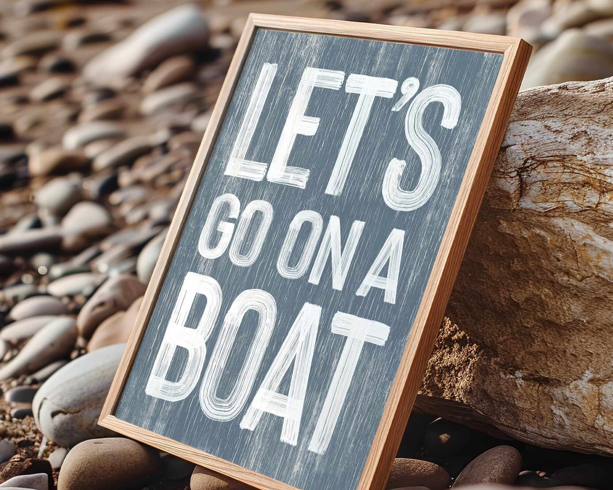 a sign that says let's go on a boat on the beach