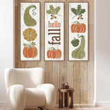 a white chair sitting in front of a wooden wall