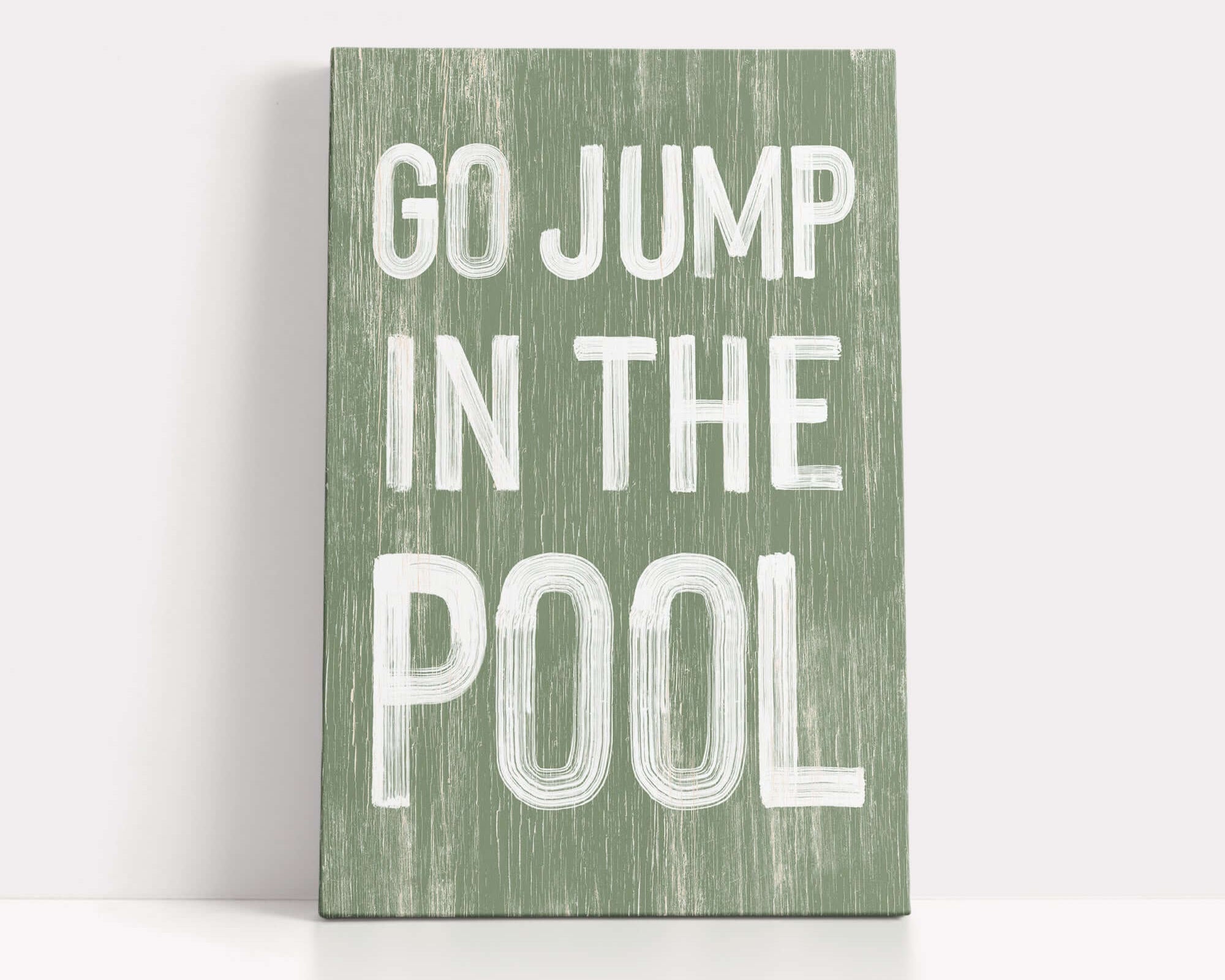 a green sign that says go jump in the pool