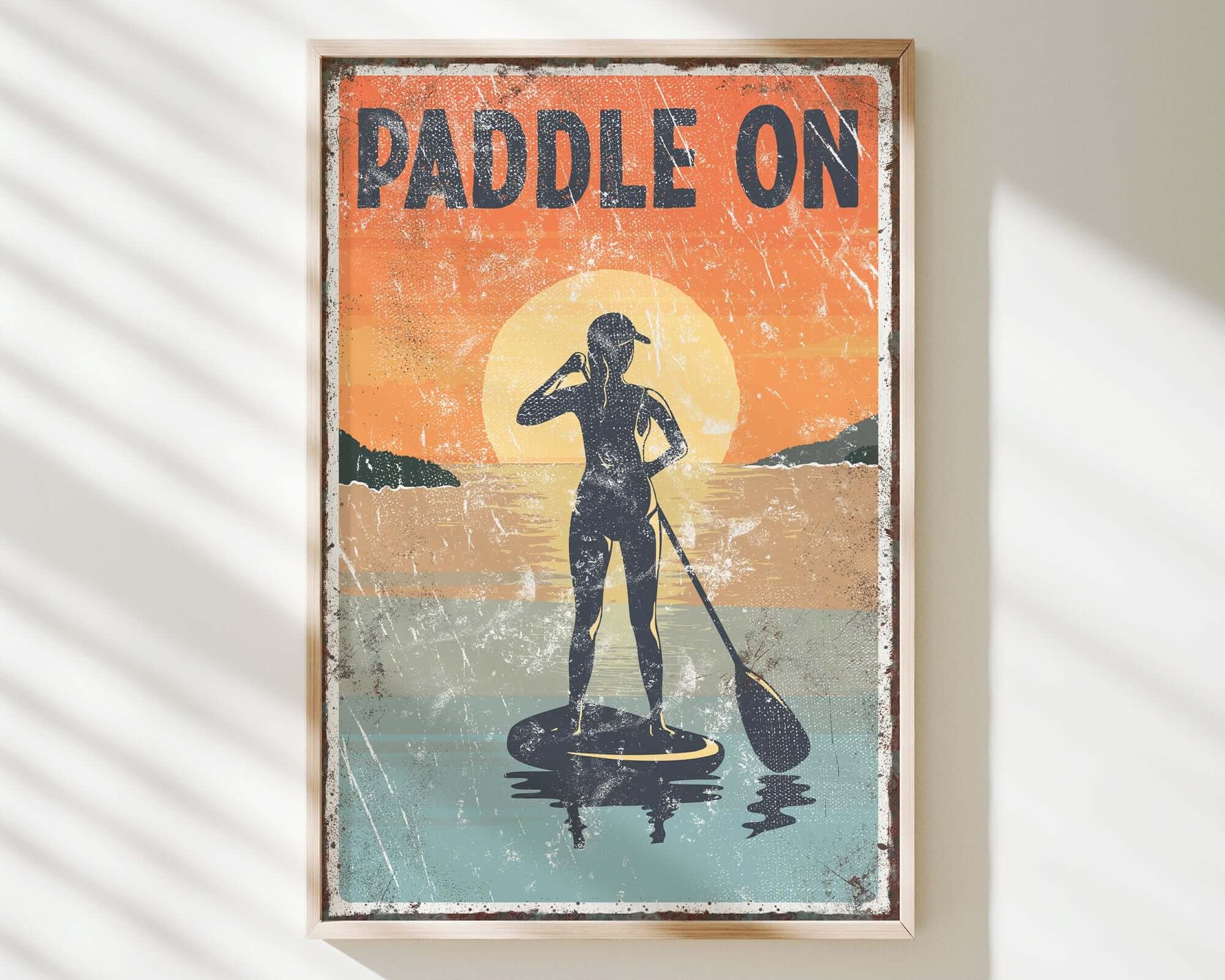 a vintage paddle on poster hangs on a wall
