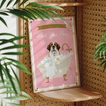 A framed poster with a dog sitting in a bathtub, surrounded by bubbles, and the text "Please don't forget to wash your paws" is displayed on a wall.
