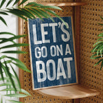 a sign that says let&#39;s go on a boat on a shelf