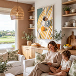 A woman and a young boy are sitting together on a couch in a cozy living room, with a large window overlooking a scenic outdoor view. The room is decorated with various plants, a hanging lamp, and a framed artwork on the wall.