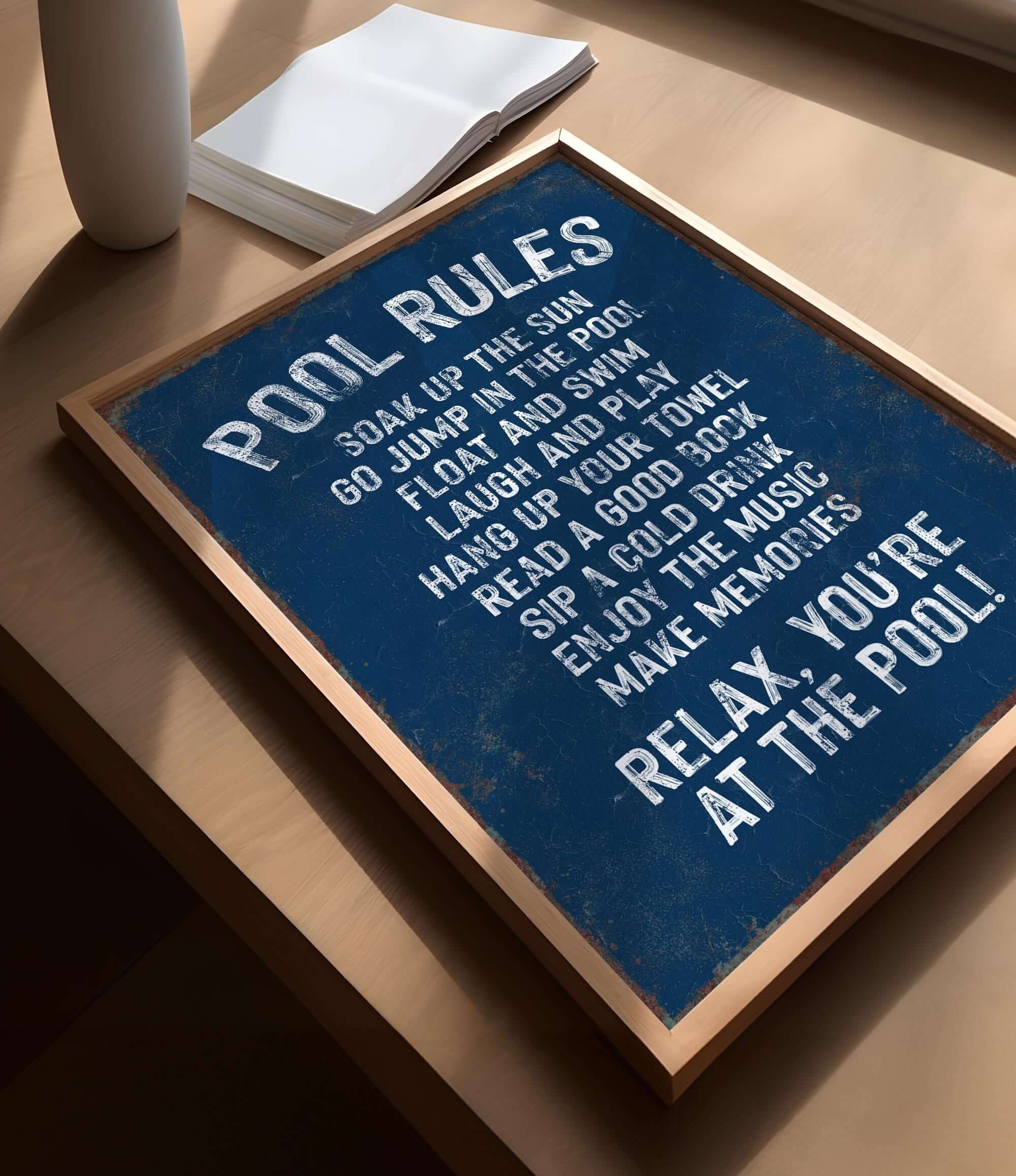 a blue sign sitting on top of a wooden table