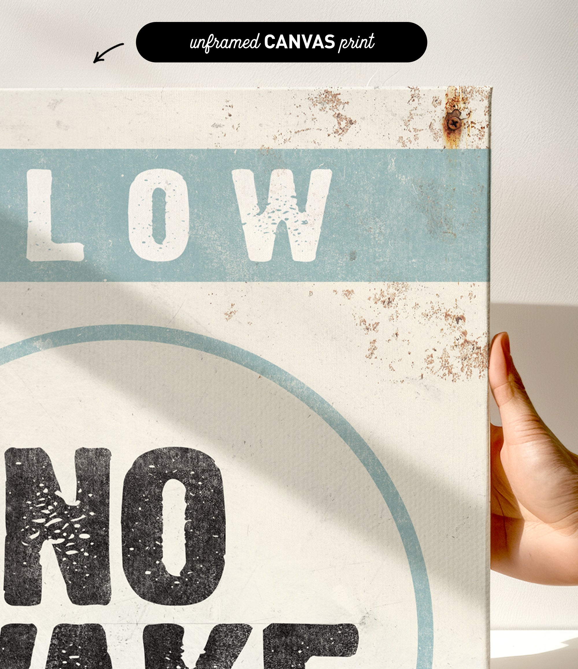 a hand holding a sign that says slow no wave