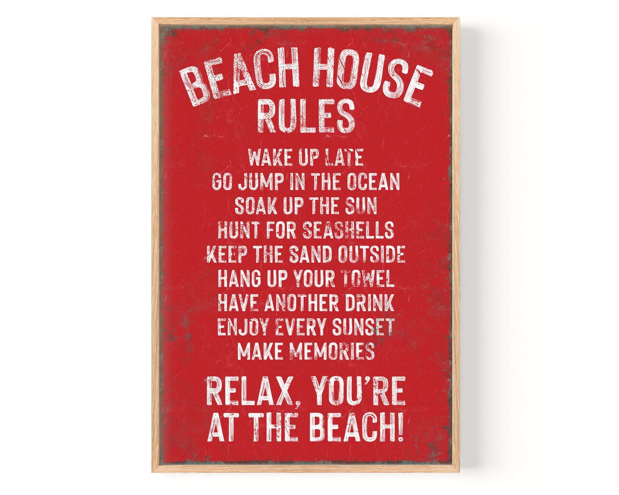 The Beach House Rules Sign in Real Red with rusted edges features fun sayings like "Wake up late" and "Relax, you're at the beach!"—a charming modern farmhouse accent for any coastal retreat or home wall decor.