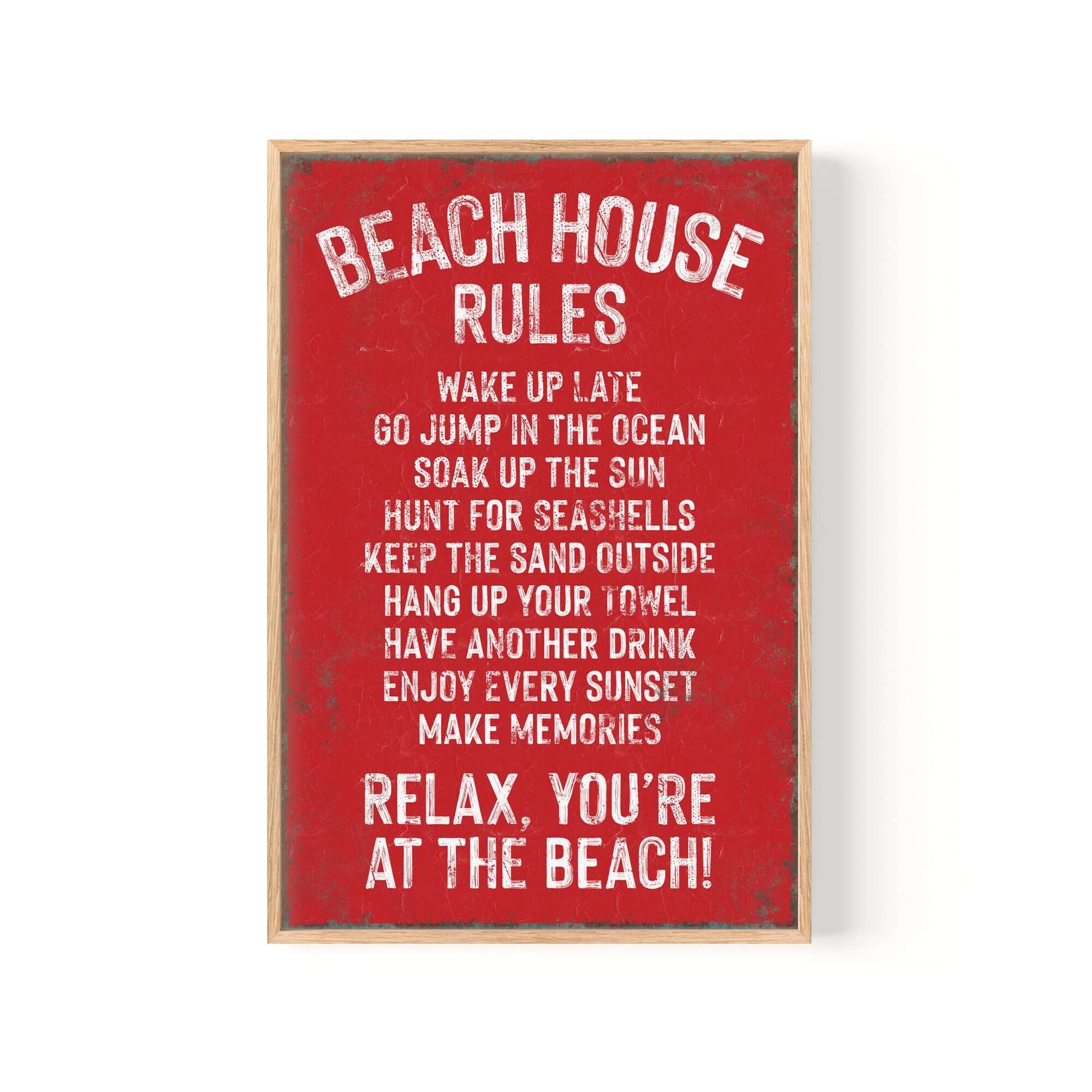 The Beach House Rules Sign in Real Red with rusted edges features fun sayings like "Wake up late" and "Relax, you're at the beach!"—a charming modern farmhouse accent for any coastal retreat or home wall decor.